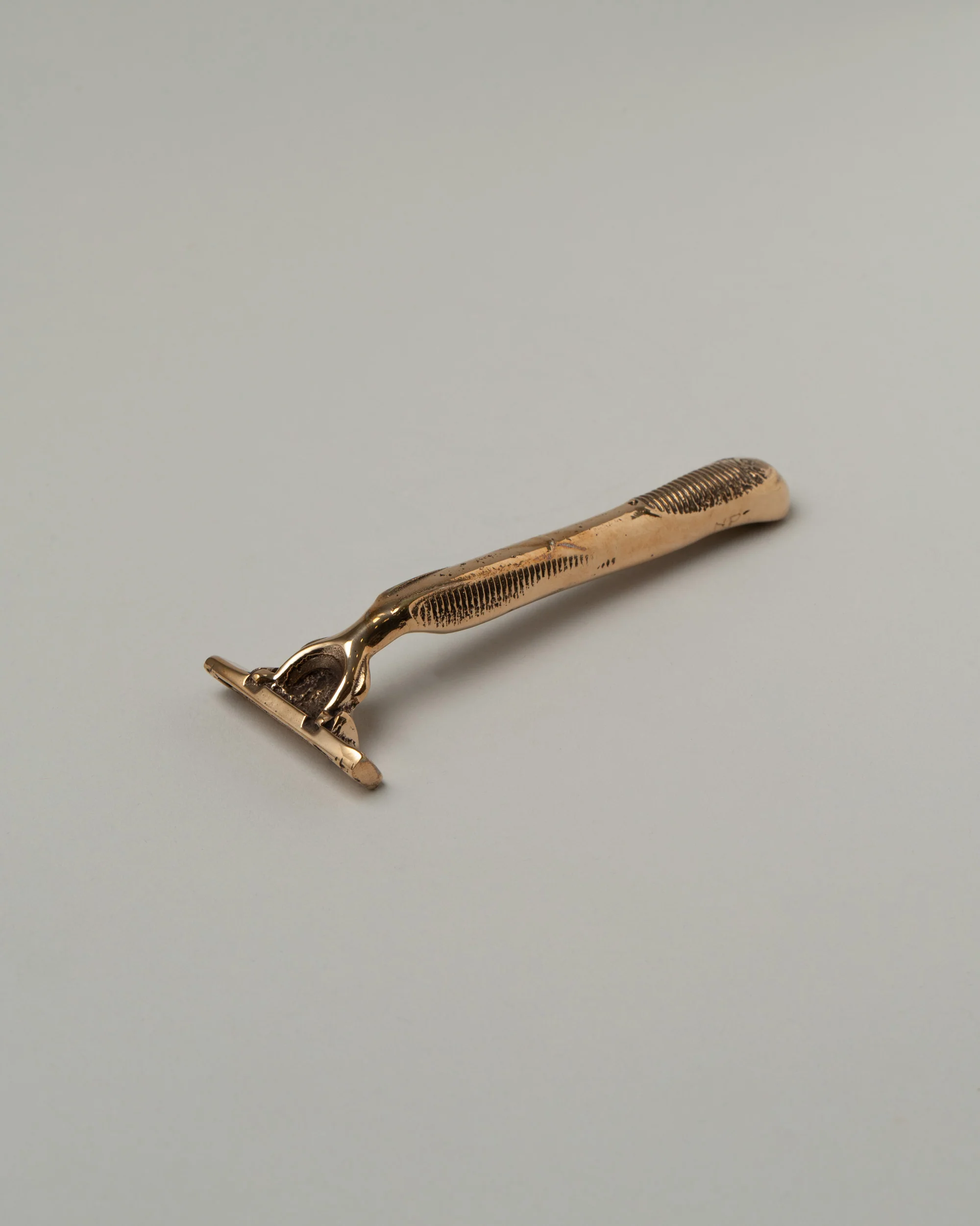 Cast Bronze Razor